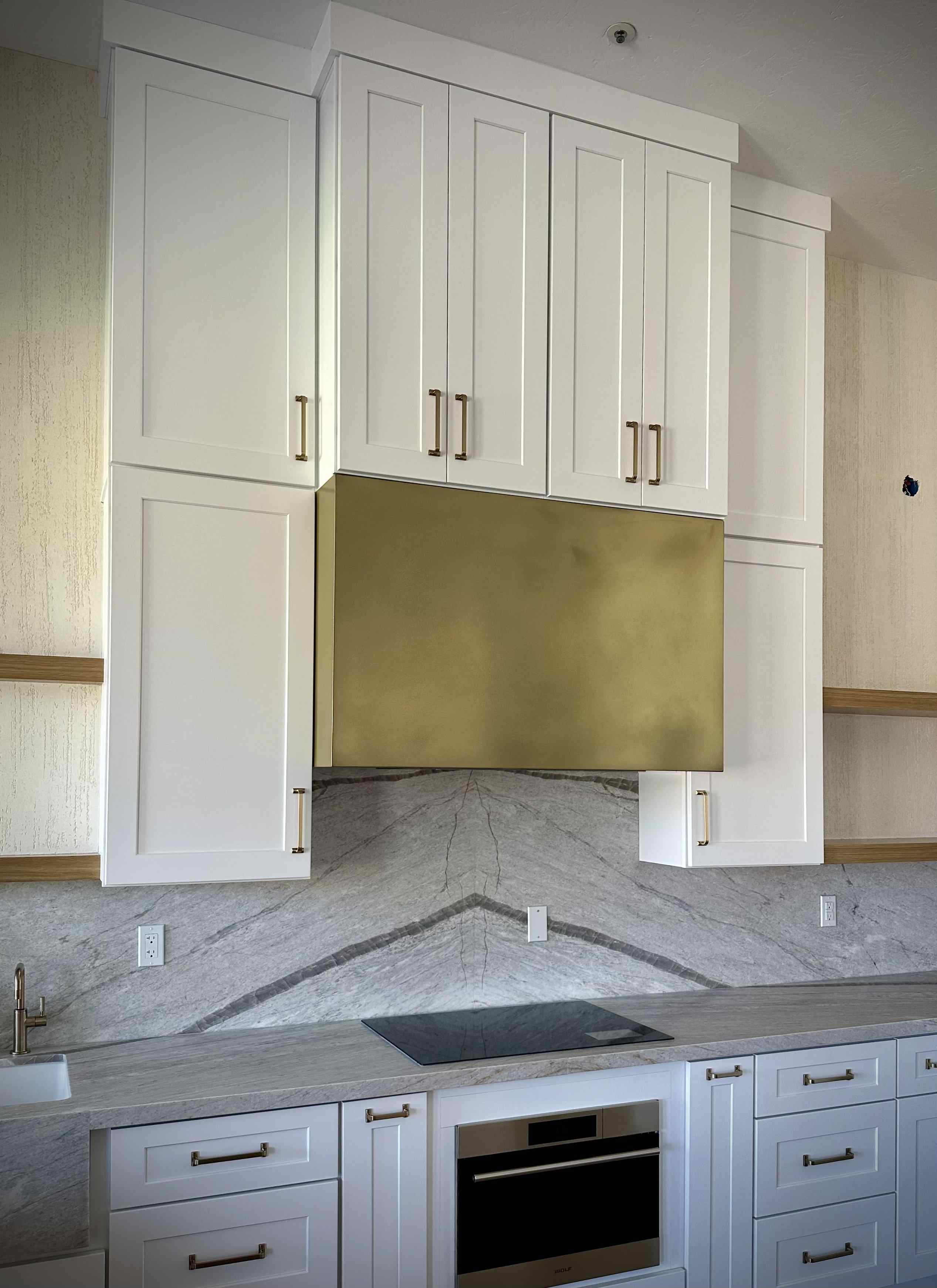 Scottsdale Safari Condos bronze backsplash unsealed patina